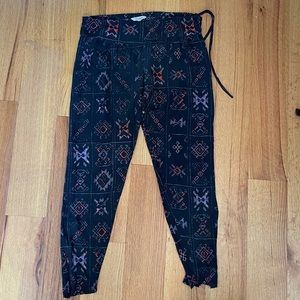 Silk Tucker pants with geometric pattern